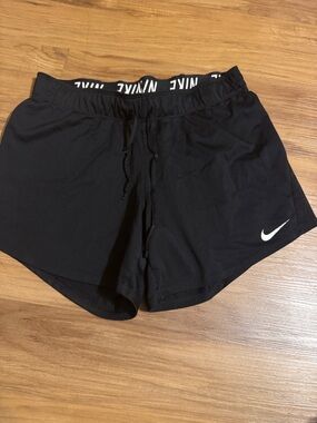 Nike Women's Black Athletic Running Shorts with White Swoosh